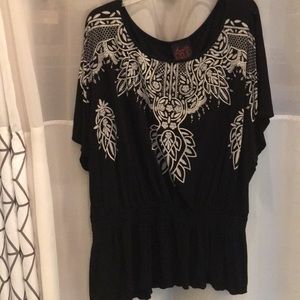 Plus sized black peplum top